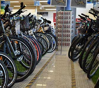 A room filled with bicycles lined up.